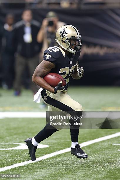 Marcus Murphy of the New Orleans Saints runs the ball during the game against the New York Giants at the Mercedes-Benz Superdome on November 1, 2015...