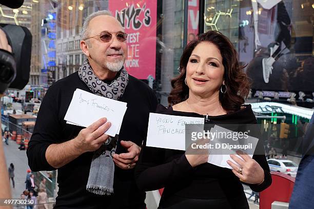 Emilio Estefan and Gloria Estefan visit "Extra" at their New York Studios at H&M in Times Square on November 18, 2015 in New York City.