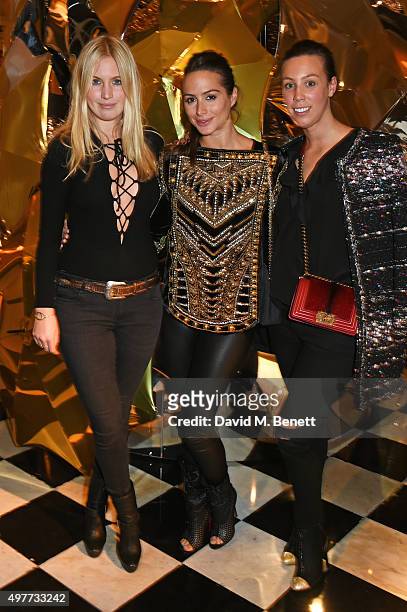 Marissa Montgomery, Saskia Boxford and Melissa Mills attend the Claridge's Christmas Tree Party 2015, designed by Christopher Bailey for Burberry, at...