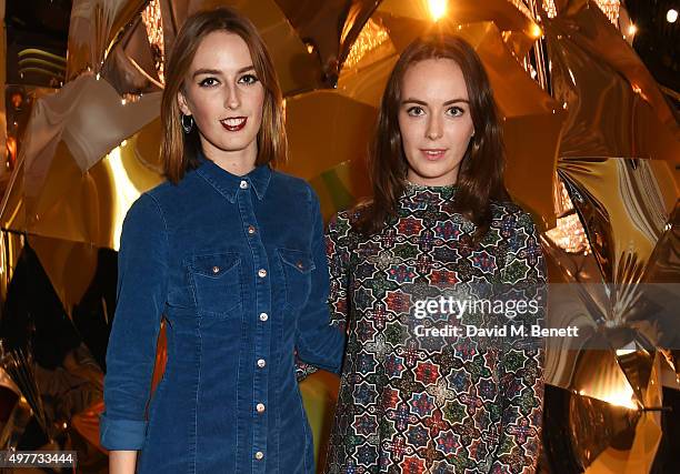 Lady Alice Manners and Lady Eliza Manners attend the Claridge's Christmas Tree Party 2015, designed by Christopher Bailey for Burberry, at Claridge's...