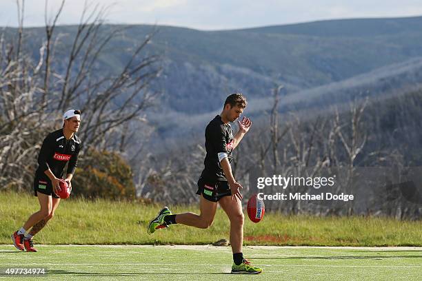 Matt Scharenberg kicks the ball during a Collingwood Magpies AFL pre-season training camp at Falls Creek on November 19, 2015 in Falls Creek,...