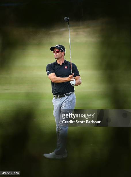 Adam Scott of Australia plays an approach shot during day one of the 2015 Australian Masters at Huntingdale Golf Course on November 19, 2015 in...