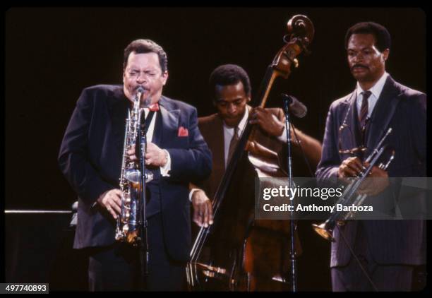 From left, American jazz musicians Jackie McLean , on saxophone, Cecil McBee, on bass, and Woody Shaw , on trumpet, perform on stage during the 'One...