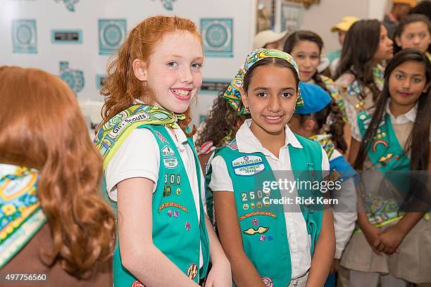 Girl Scouts attend the grand opening of Marisol Deluna New York Design Studio and Educational Foundation at La Villita Historic Art Village on...