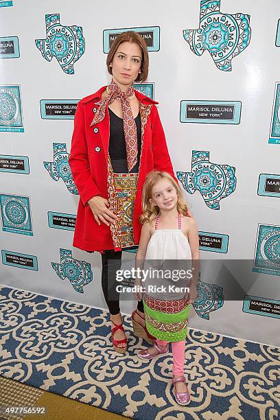 Models pose backstage during the grand opening of Marisol Deluna New York Design Studio and Educational Foundation at La Villita Historic Art Village...