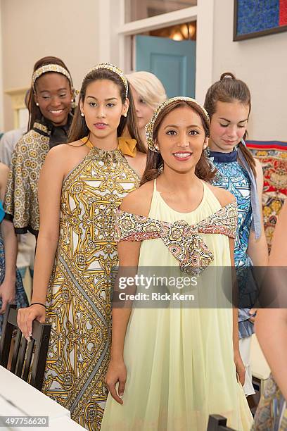 Models prepare backstage before the grand opening of Marisol Deluna New York Design Studio and Educational Foundation at La Villita Historic Art...