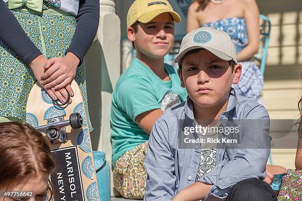 Models attend the grand opening of Marisol Deluna New York Design Studio and Educational Foundation at La Villita Historic Art Village on November...