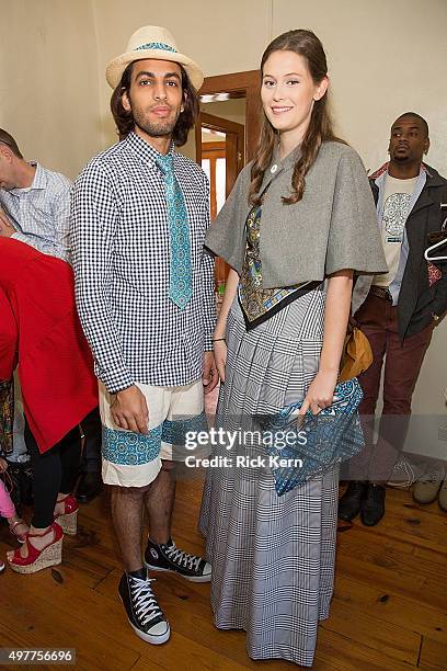 Models prepare backstage before the grand opening of Marisol Deluna New York Design Studio and Educational Foundation at La Villita Historic Art...