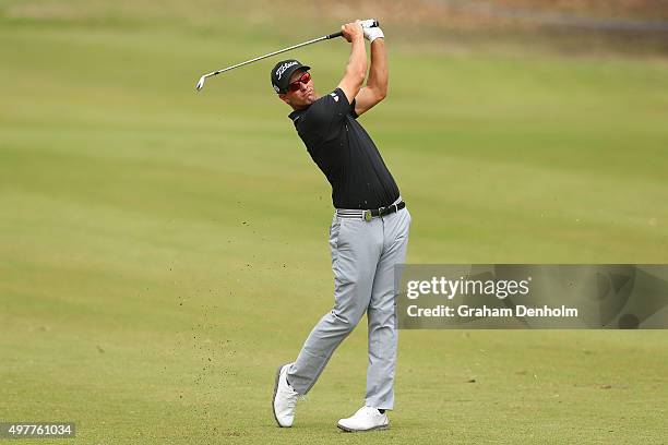 Adam Scott of Australia hits a shot from the fairway during day one of the 2015 Australian Masters at Huntingdale Golf Course on November 19, 2015 in...