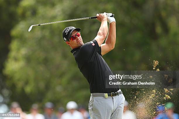 Adam Scott of Australia hits a shot from the fairway during day one of the 2015 Australian Masters at Huntingdale Golf Course on November 19, 2015 in...