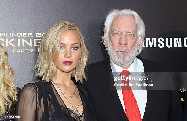 Actors Jennifer Lawrence and Donald Sutherland attend the "The Hunger Games: Mockingjay- Part 2" New York premiere at AMC Loews Lincoln Square 13...