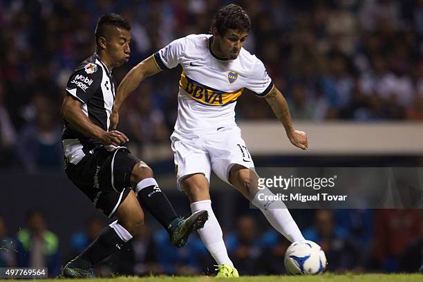 Marcelo Meli of Boca Juniors kicks the ball during the opening friendly match between Puebla and Boca Juniors at Cuauhtemoc Stadium on November 18,...