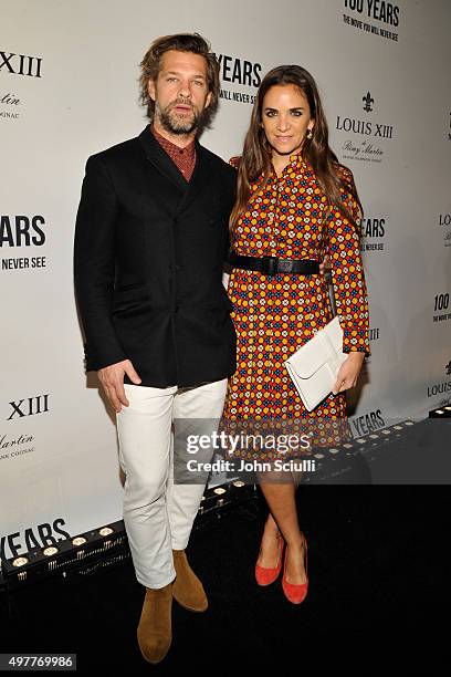 Artist Aaron Young and fashion entrepreneur Laure Heriard Dubreuil attend Louis XIII Celebration of "100 Years" The Movie You Will Never See,...