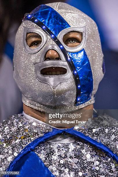 Fan of Puebla sings during the opening friendly match between Puebla and Boca Juniors at Cuauhtemoc Stadium on November 18, 2015 in Puebla, Mexico.