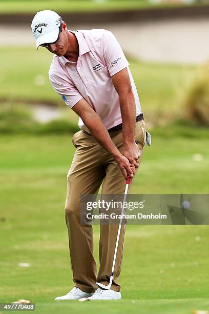 Nicolas Colsaerts of Belgium chips onto the green during day one of the 2015 Australian Masters at Huntingdale Golf Course on November 19, 2015 in...