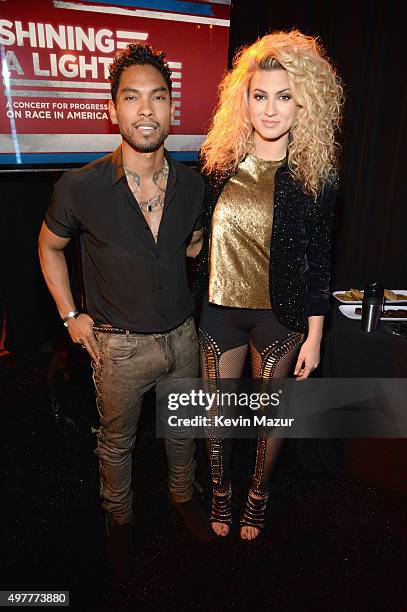 Recording artists Miguel and Tori Kelly attend A+E Networks "Shining A Light" concert at The Shrine Auditorium on November 18, 2015 in Los Angeles,...