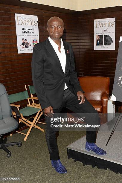 Singer/songwriter Seal poses before signing copies of his album "7" at Barnes & Noble at The Grove on November 18, 2015 in Los Angeles, California.