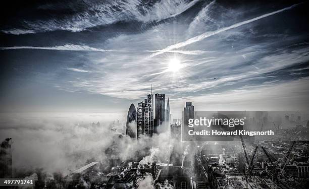 london city kooking south in fog and sunshine - aerial view london stock-fotos und bilder
