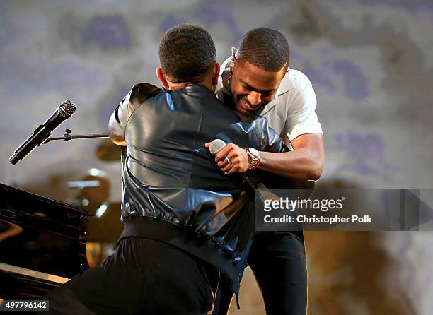 Recording artists Big Sean and John Legend perform onstage at A+E Networks "Shining A Light" concert at The Shrine Auditorium on November 18, 2015 in...