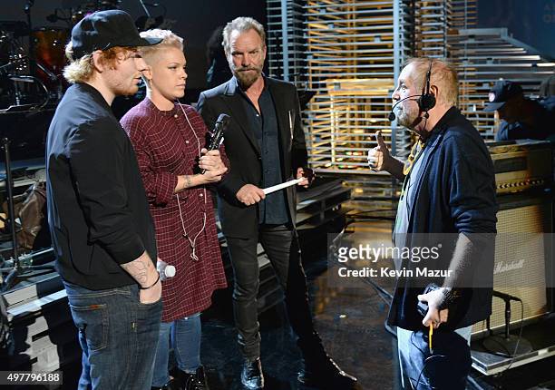 Musicians Ed Sheeran, P!nk, Sting and executive producer Ken Ehrlich onstage at A+E Networks "Shining A Light" concert at The Shrine Auditorium on...