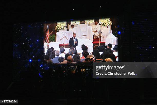 Pharrell Williams appears onscreen performs onstage at A+E Networks "Shining A Light" concert at The Shrine Auditorium on November 18, 2015 in Los...