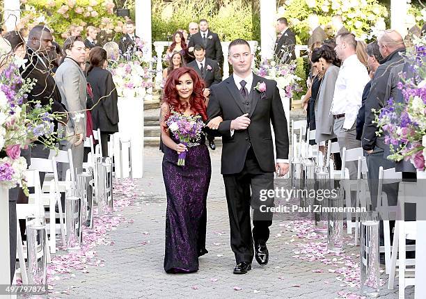 Television personality and bridesmaid Nicole 'Snooki' Polizzi attends the wedding of television personalities Jenni 'JWoww' Farley and Roger Mathews...