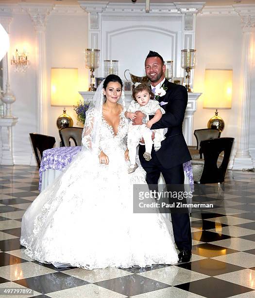 Jenni 'JWoww' Farley, daughter Meilani Alexandra Mathews and Roger Mathews pose for wedding pictures at the wedding of television personalities Jenni...