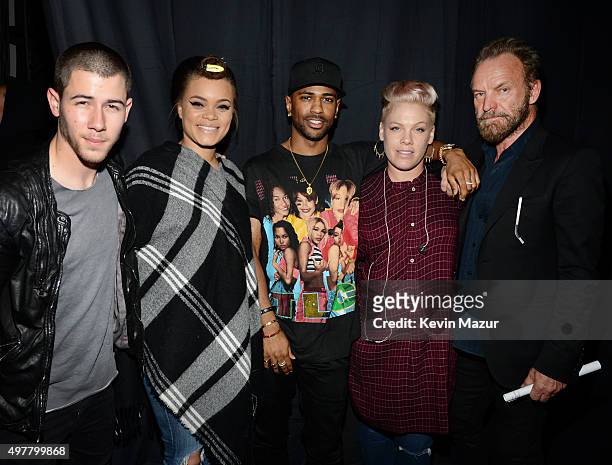 Recording artists Nick Jonas, Andra Day, Big Sean, Pink and Sting attend A+E Networks "Shining A Light" concert at The Shrine Auditorium on November...