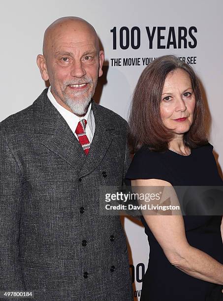 Actor John Malkovich and Nicoletta Peyran attend LOUIS XIII toasts to "100 Years: The Movie You Will Never See" at the Sheats Goldstein residence on...