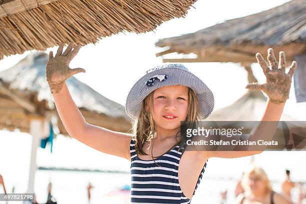 sand on hands - mamaia romania stock pictures, royalty-free photos & images