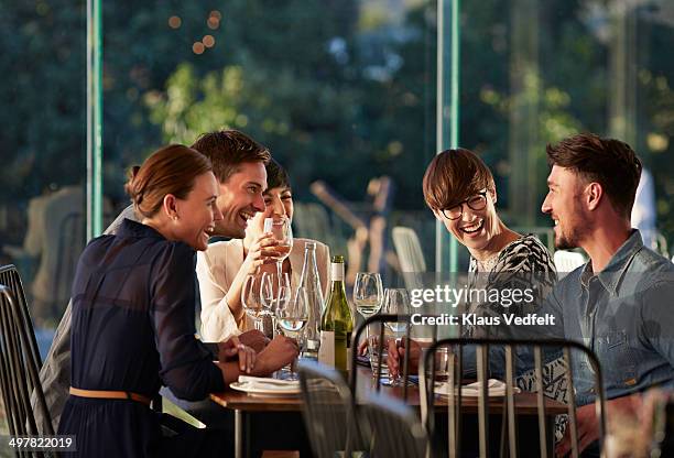 friends having a good time at dinner - group of friends out to lunch stock pictures, royalty-free photos & images