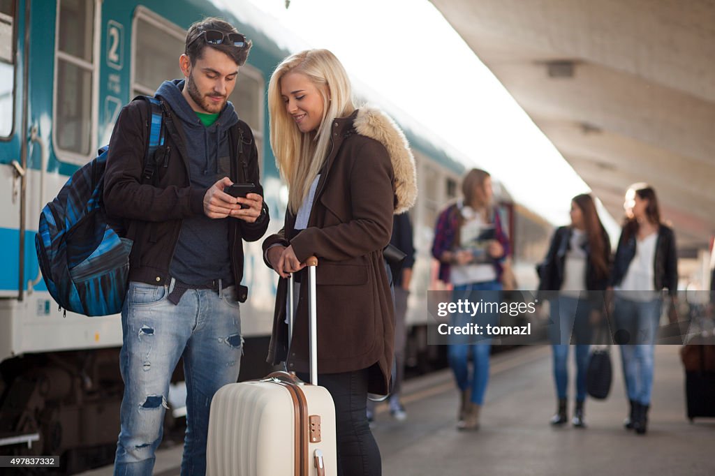 Young people on train station