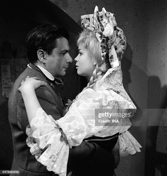 Michel Galabru and Marie Versini in a scene of "Friend Fritz" realized by Georges Folgoas