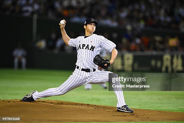 Starting pitcher Shohei Otani of Japan throws in the top of first inning during the WBSC Premier 12 semi final match between South Korea and Japan at...