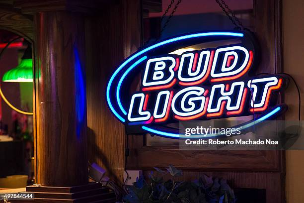 Signage of Bud light outside a bar in New York City, United States. Bud Light is Budweiser's flagship light beer with 4.2% ABV. The brand is owned by...