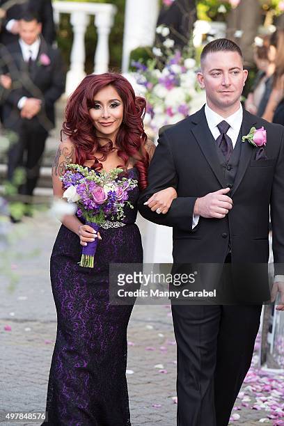 Television personality and bridesmaid Nicole "Snooki" Polizzi attends the wedding of television personalities Jenni 'JWoww' Farley and Roger Mathews...