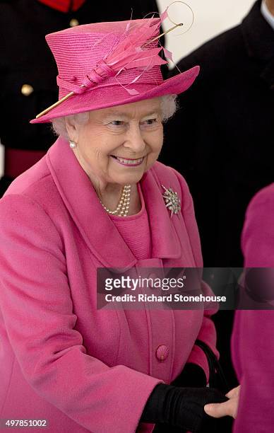 Queen Elizabeth II meets staff during a tour of the new Birmingham Hospital and School of Dentistry before officially opening the building, on...