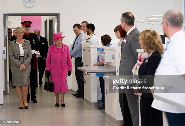 Queen Elizabeth II with Tracey Taylor Head of the NHS Trust tours the new Birmingham Hospital and School of Dentistry before officially opening the...