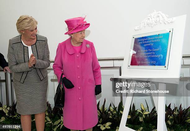 Queen Elizabeth II with Tracey Taylor Head of the NHS Trust officially opens the new Birmingham Hospital and School of Dentistry on November 19, 2015...