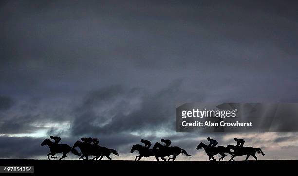 General view as runners race down the back straight at Wincanton racecourse on November 19, 2015 in Wincanton, England.