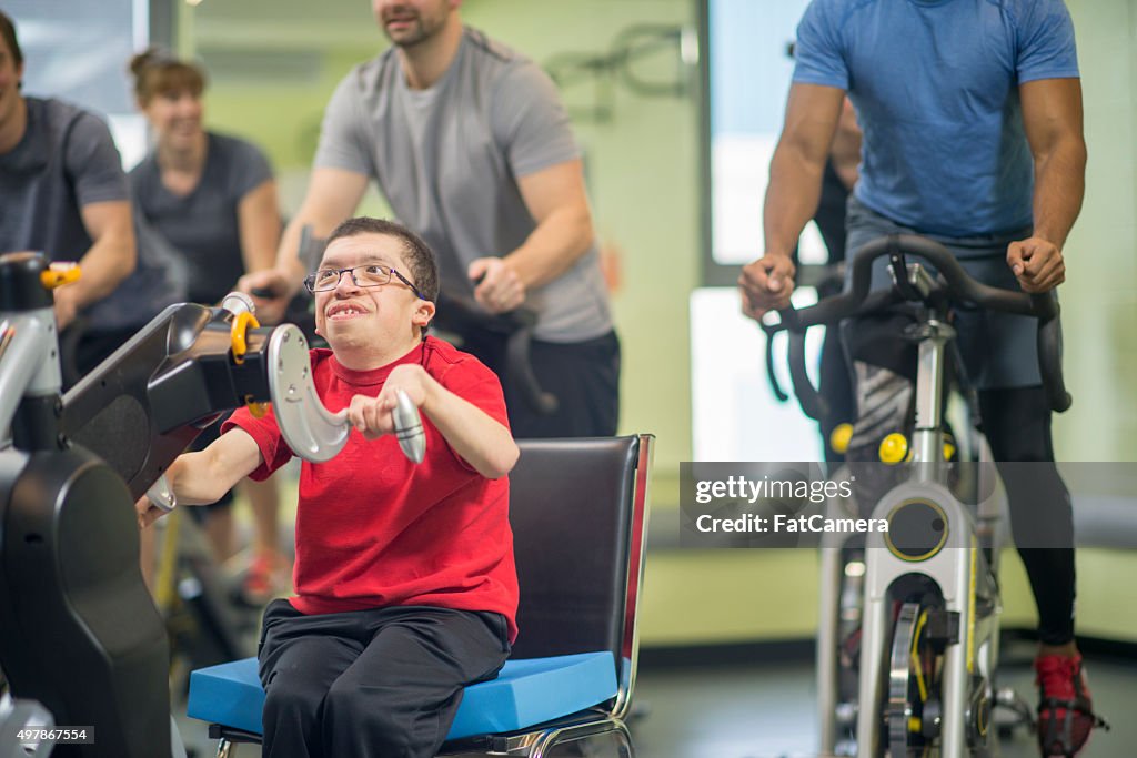 Disabled Man in a Cycling Class