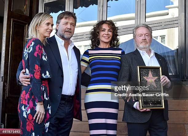 Actors Kristen Wiig and Russell Crowe, Giannina Facio and director Ridley Scott attend the ceremony honoring Ridley Scott with a star on the...