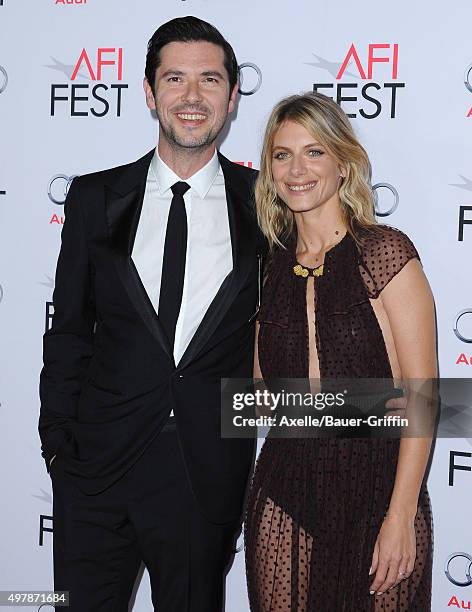 Actors Melvil Poupaud and Melanie Laurent arrive at the AFI FEST 2015 presented by Audi Opening Night Gala Premiere of Universal Pictures' 'By The...