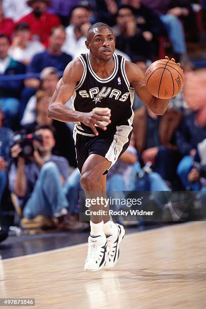 Avery Johnson of the San Antonio Spurs dribbles against the Sacramento Kings circa 1996 at Arco Arena in Sacramento, California. NOTE TO USER: User...