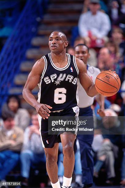 Avery Johnson of the San Antonio Spurs dribbles against the Sacramento Kings circa 1996 at Arco Arena in Sacramento, California. NOTE TO USER: User...