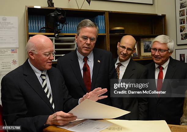 Republican Presidential candidate Jeb Bush files paperwork at the State House November 19, 2015 in Concord, New Hampshire. Earlier in the day Bush...