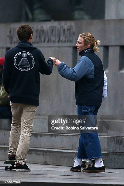 Rocco Ritchie gestures to another skateboarder on November 19, 2015 in Turin, Italy.