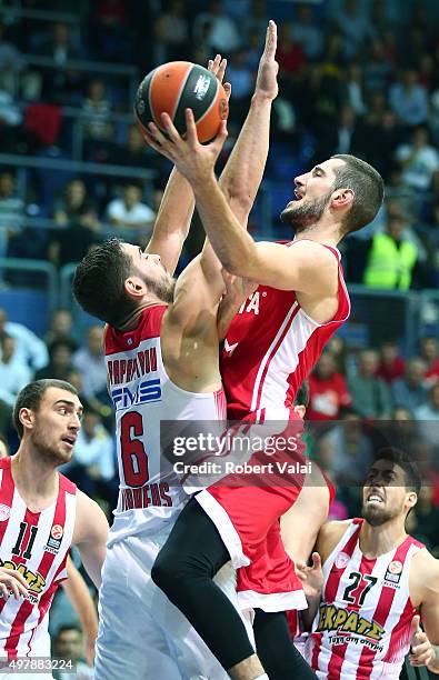 Luka Babic, #9 of Cedevita Zagreb competes with Ioannis Papapetrou, #6 of Olympiacos Piraeus during the Turkish Airlines Euroleague Regular Season...