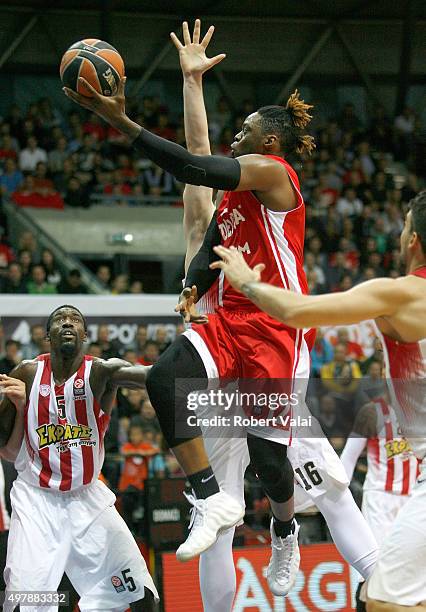Henry Walker, #12of Cedevita Zagreb competes with Othello Hunter, #5 of Olympiacos Piraeus during the Turkish Airlines Euroleague Regular Season...