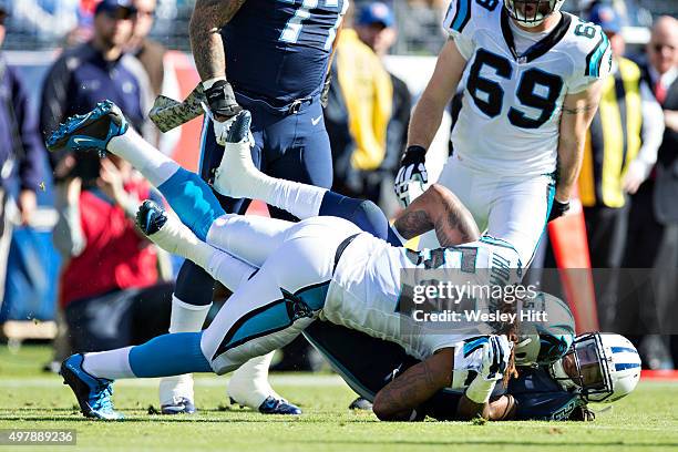 Shaq Thompson of the Carolina Panthers tackles Dexter McCluster of the Tennessee Titans at Nissan Stadium on November 15, 2015 in Nashville,...